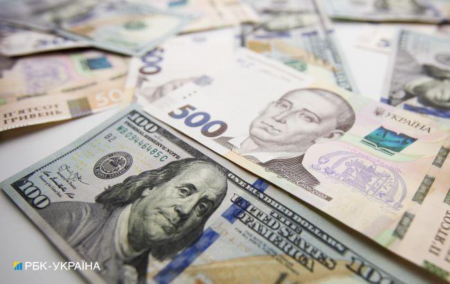 Курс доллара немного снизился после роста на прошлой неделе